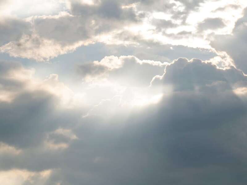 Cloudy grey sky with sunbeams. Used as a header image for a blog post titled: Doing EDI differently: Transalis launches new cloud EDI solutions
