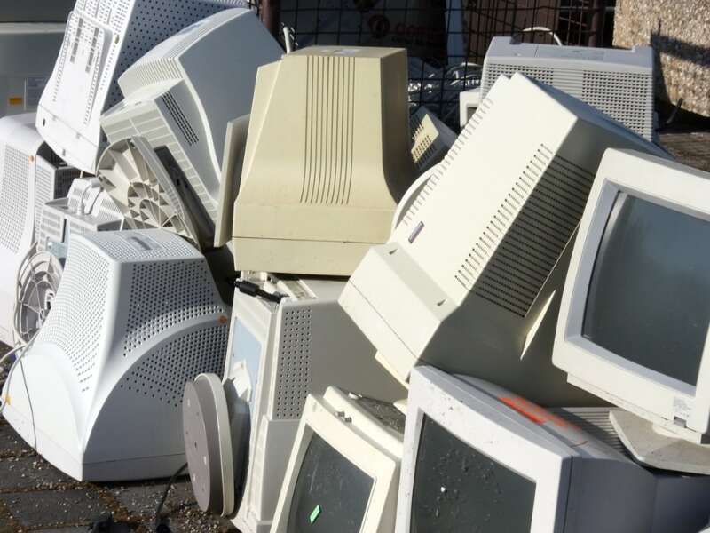 Piles of old, ugly and bulky desktop computers on a pavement. Representing Transalis blog post titled: How legacy EDI is holding you back